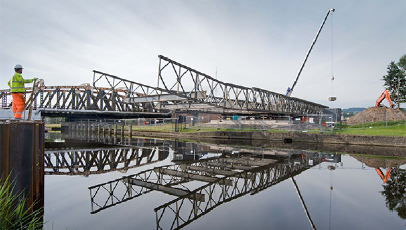 Panel bridge allows repairs to 90-year-old structure